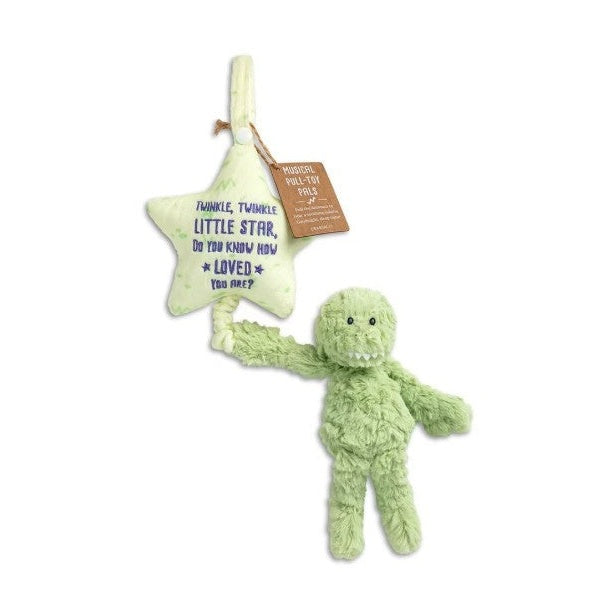 Green plush star-shaped musical toy attached to a green plush dinosaur toy.